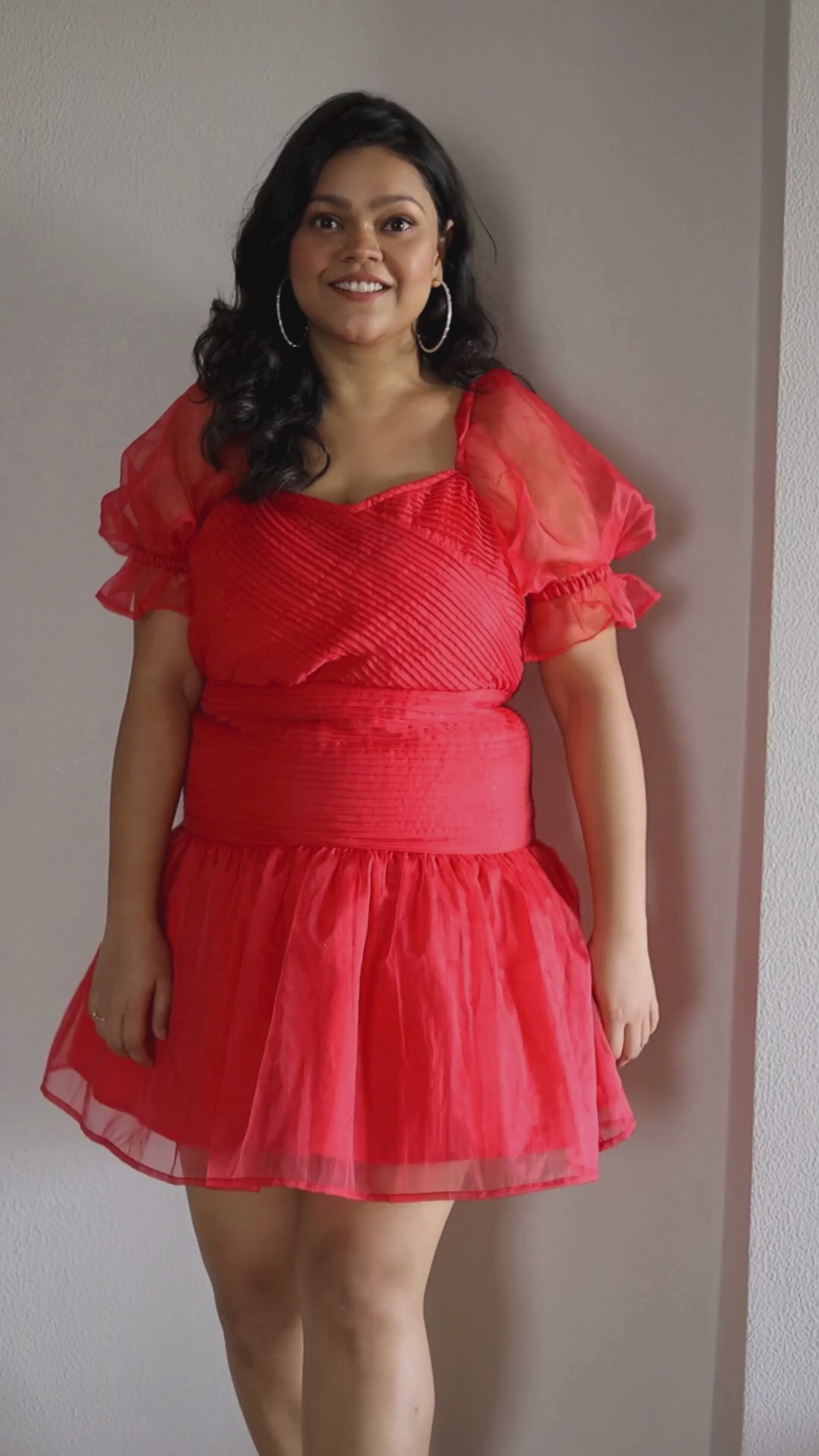 Light pink Blush Dress in airy organza with intricate pleats and refined ruffles, perfect for special events and birthday parties.